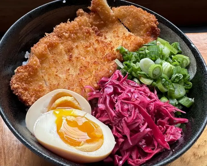 Katsu don with pork cutlet, egg and red cabbage at MB Ramen - Port Washington, a Japanese Ramen Restaurant in Port Washington